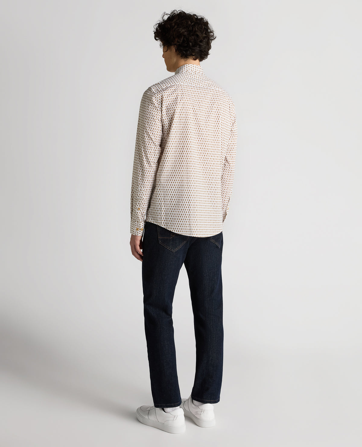 Man wearing a navy Regular Fit Print Cotton-Stretch Shirt