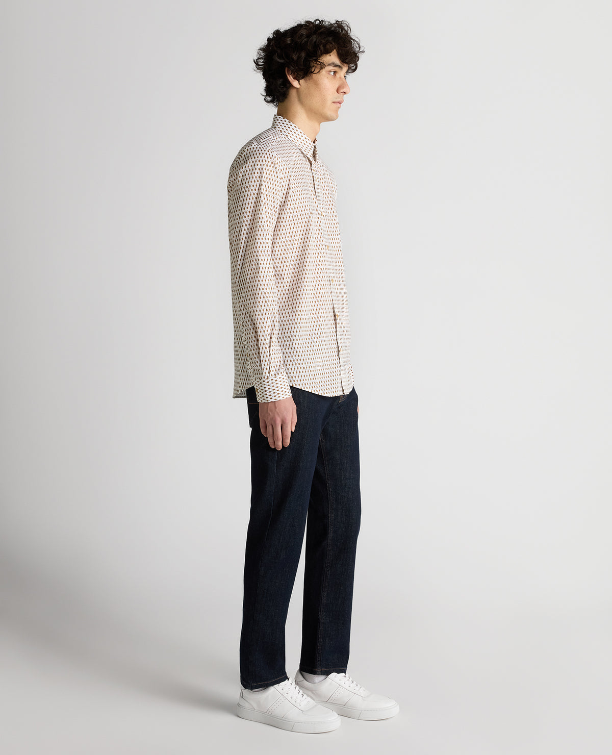 Man wearing a navy Regular Fit Print Cotton-Stretch Shirt