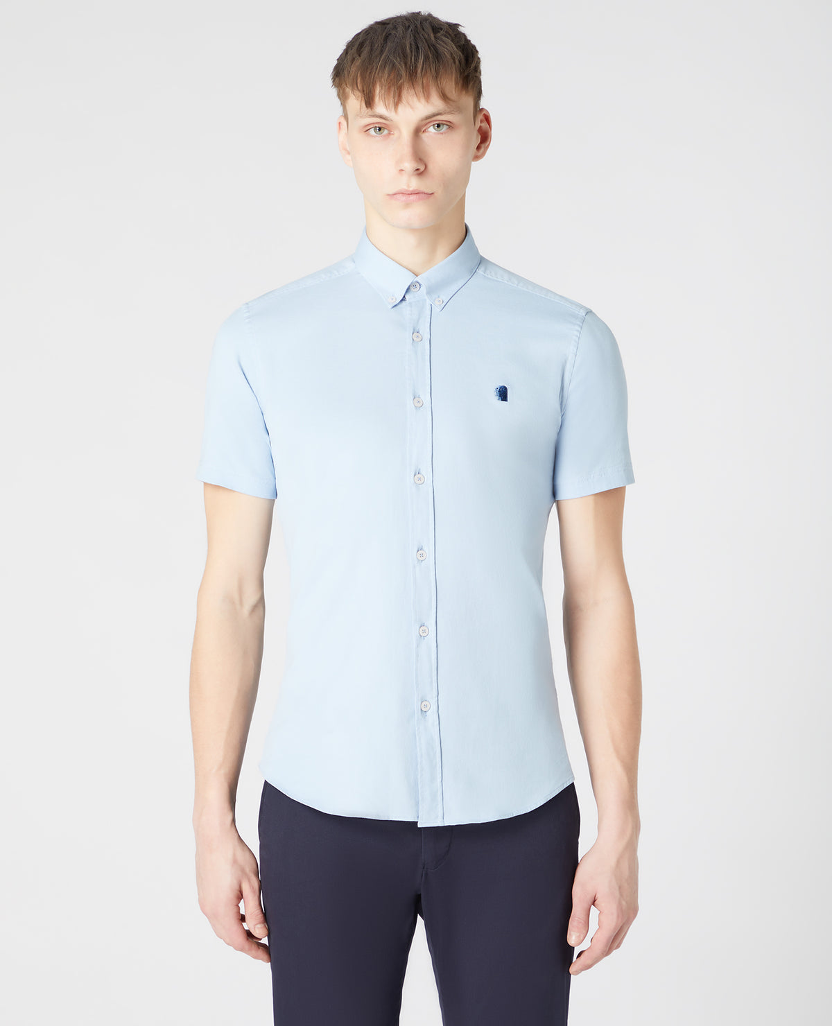 Man wearing a blue Slim Fit Cotton Stretch Shirt
