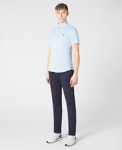 Man wearing a blue Slim Fit Cotton Stretch Shirt