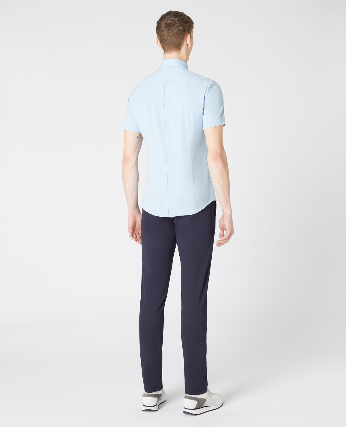 Man wearing a blue Slim Fit Cotton Stretch Shirt