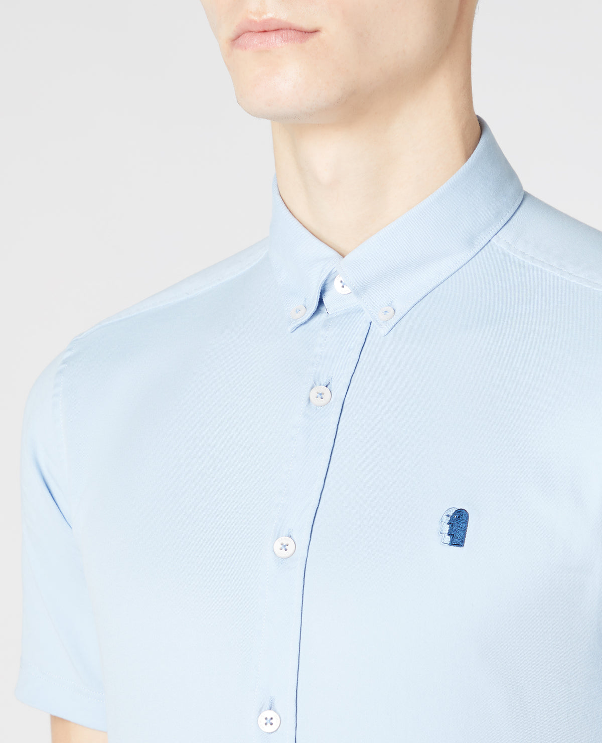 Man wearing a blue Slim Fit Cotton Stretch Shirt