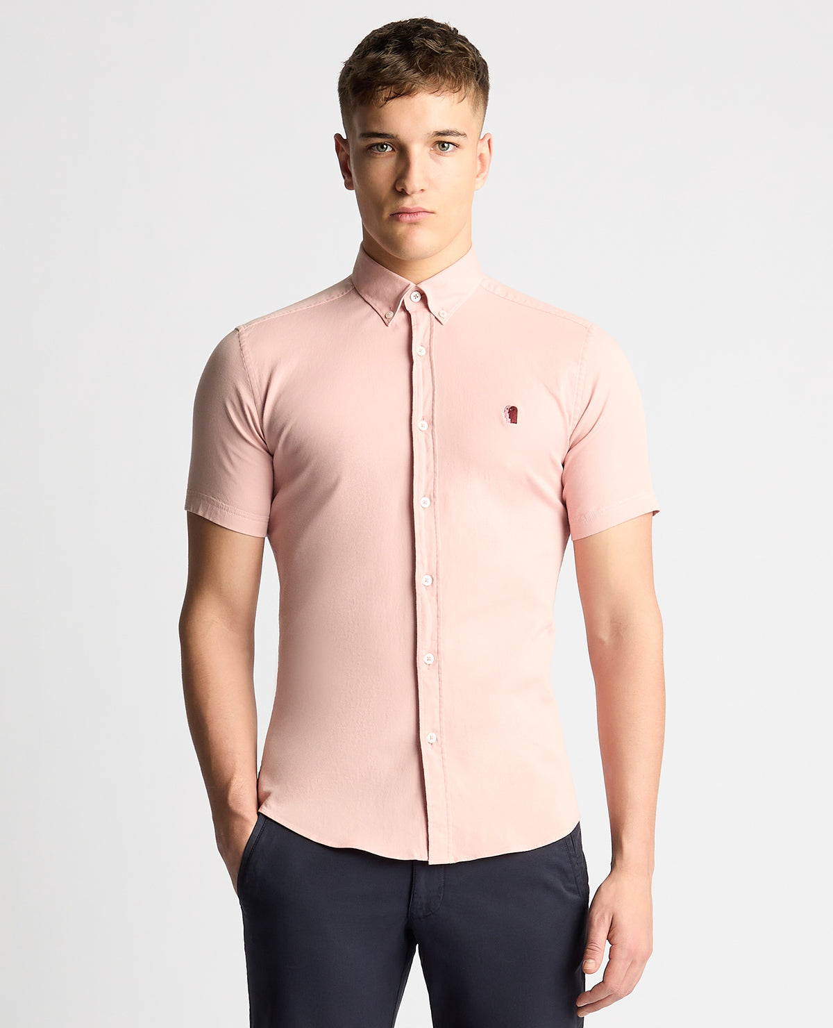 Man wearing a pink Slim Fit Cotton Stretch Short Sleeve Shirt