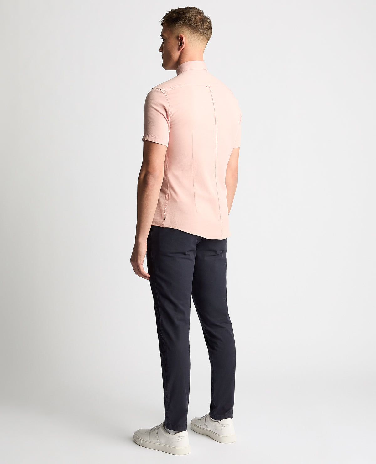 Man wearing a pink Slim Fit Cotton Stretch Short Sleeve Shirt