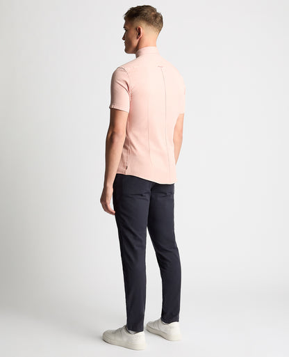 Man wearing a pink Slim Fit Cotton Stretch Short Sleeve Shirt