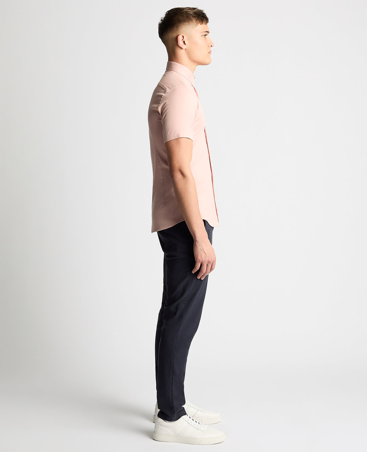 Man wearing a pink Slim Fit Cotton Stretch Short Sleeve Shirt