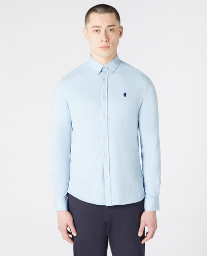Man wearing a blue Slim Fit Cotton Stretch Shirt
