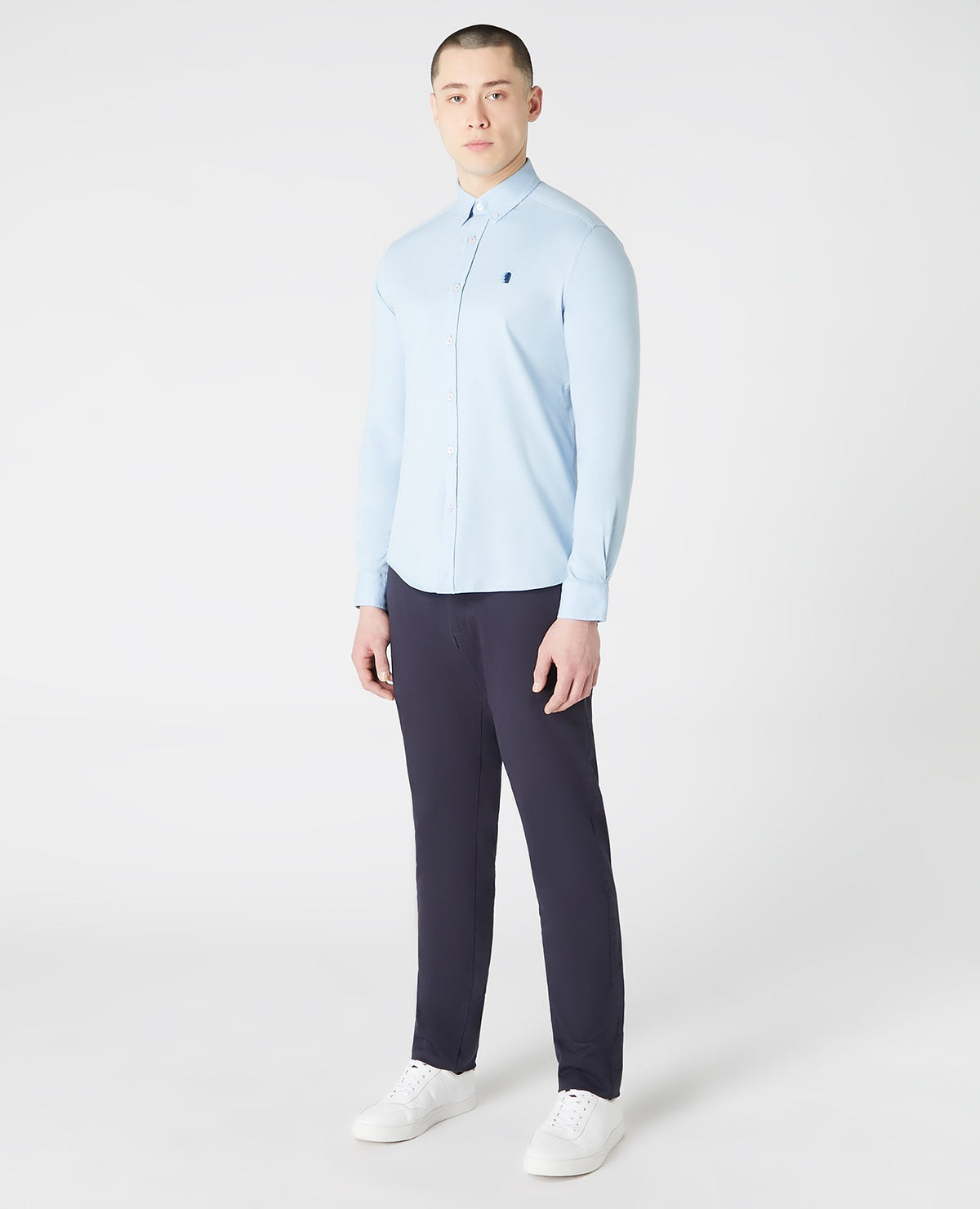 Man wearing a blue Slim Fit Cotton Stretch Shirt