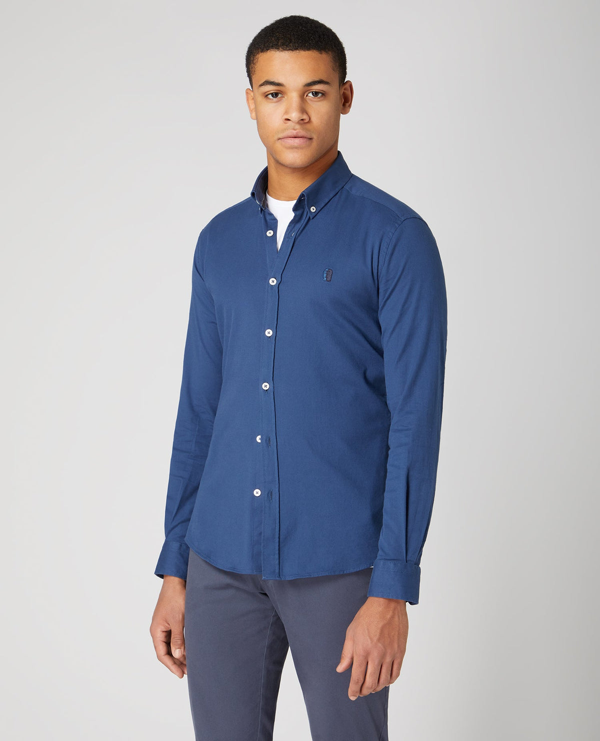 Man wearing a blue Slim Fit Cotton Stretch Shirt