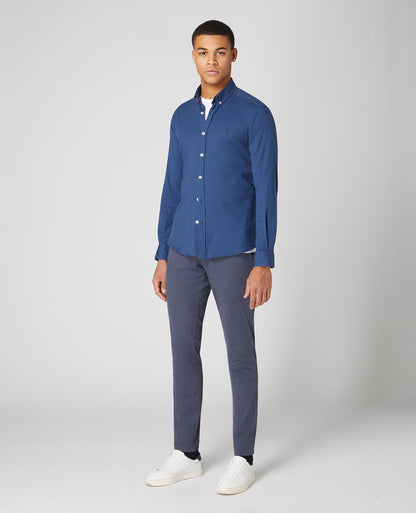 Man wearing a blue Slim Fit Cotton Stretch Shirt