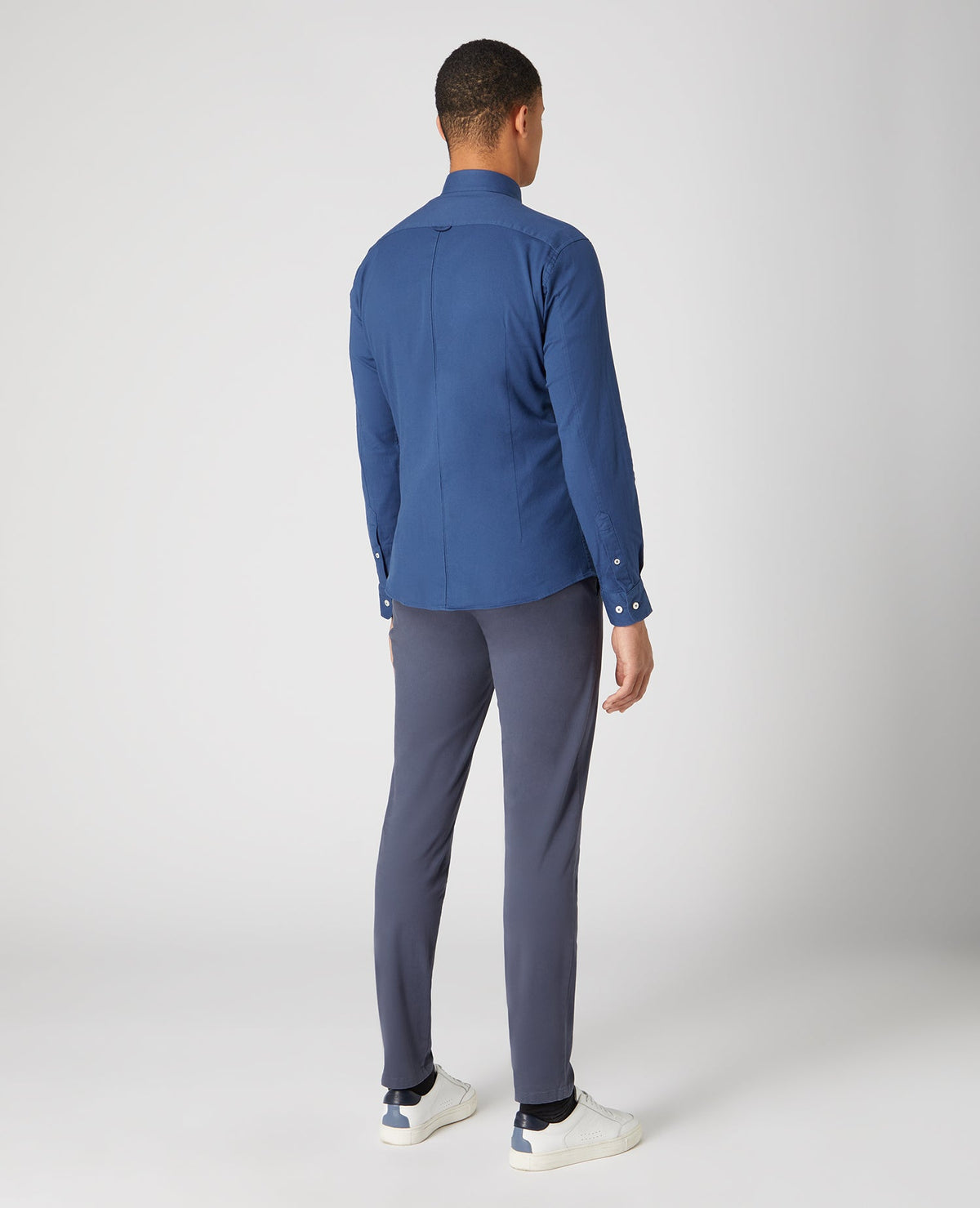 Man wearing a blue Slim Fit Cotton Stretch Shirt