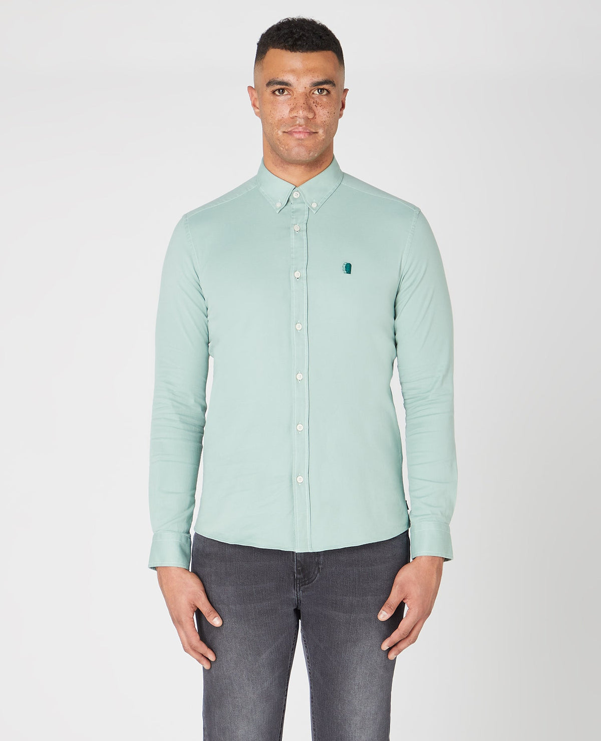 Man wearing a green Slim Fit Cotton Stretch Shirt