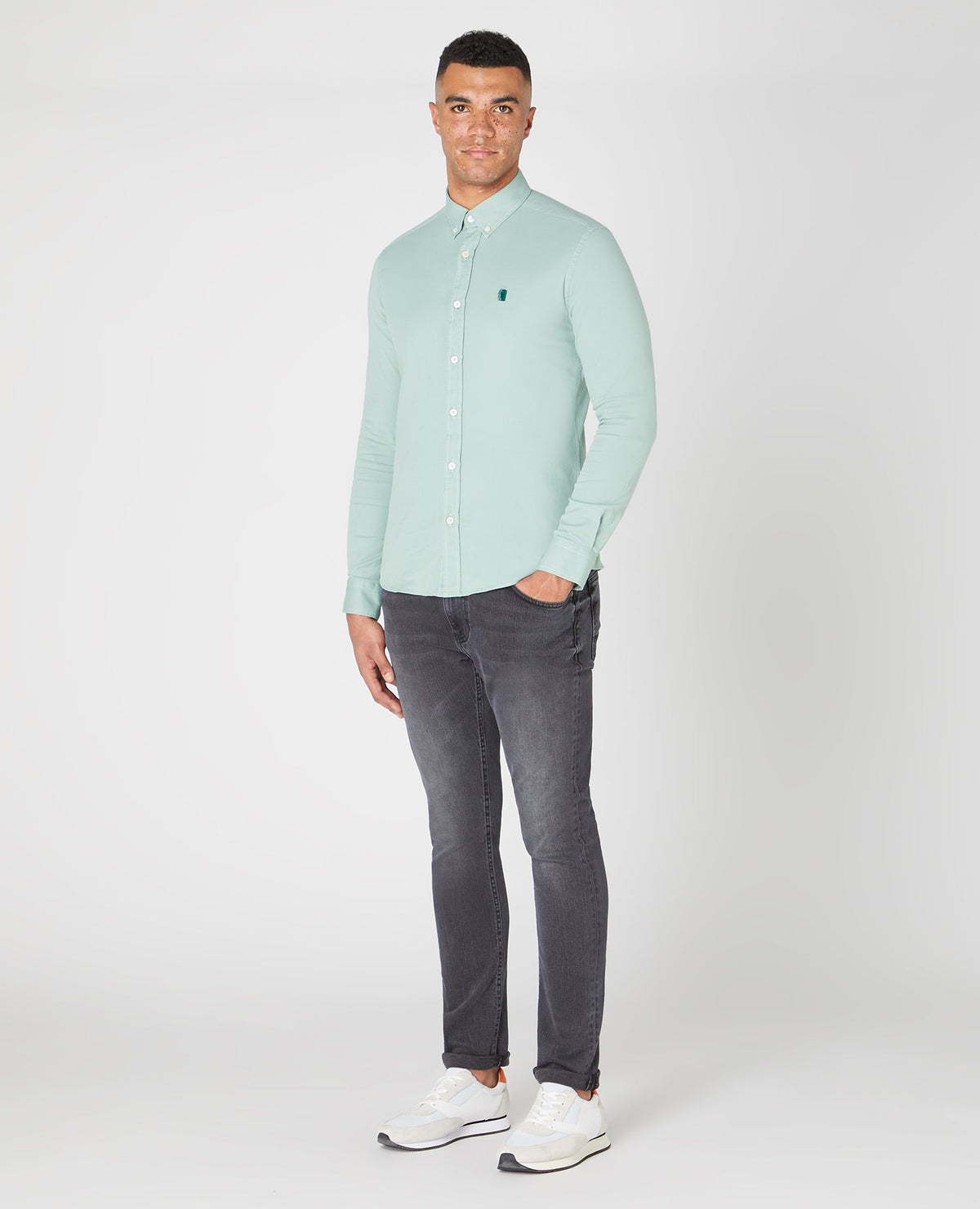 Man wearing a green Slim Fit Cotton Stretch Shirt