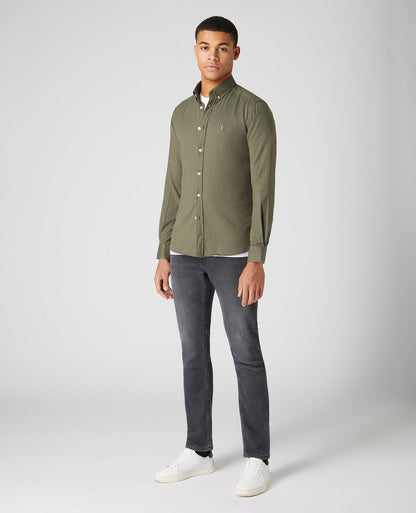 Man wearing a green Slim Fit Cotton Stretch Shirt