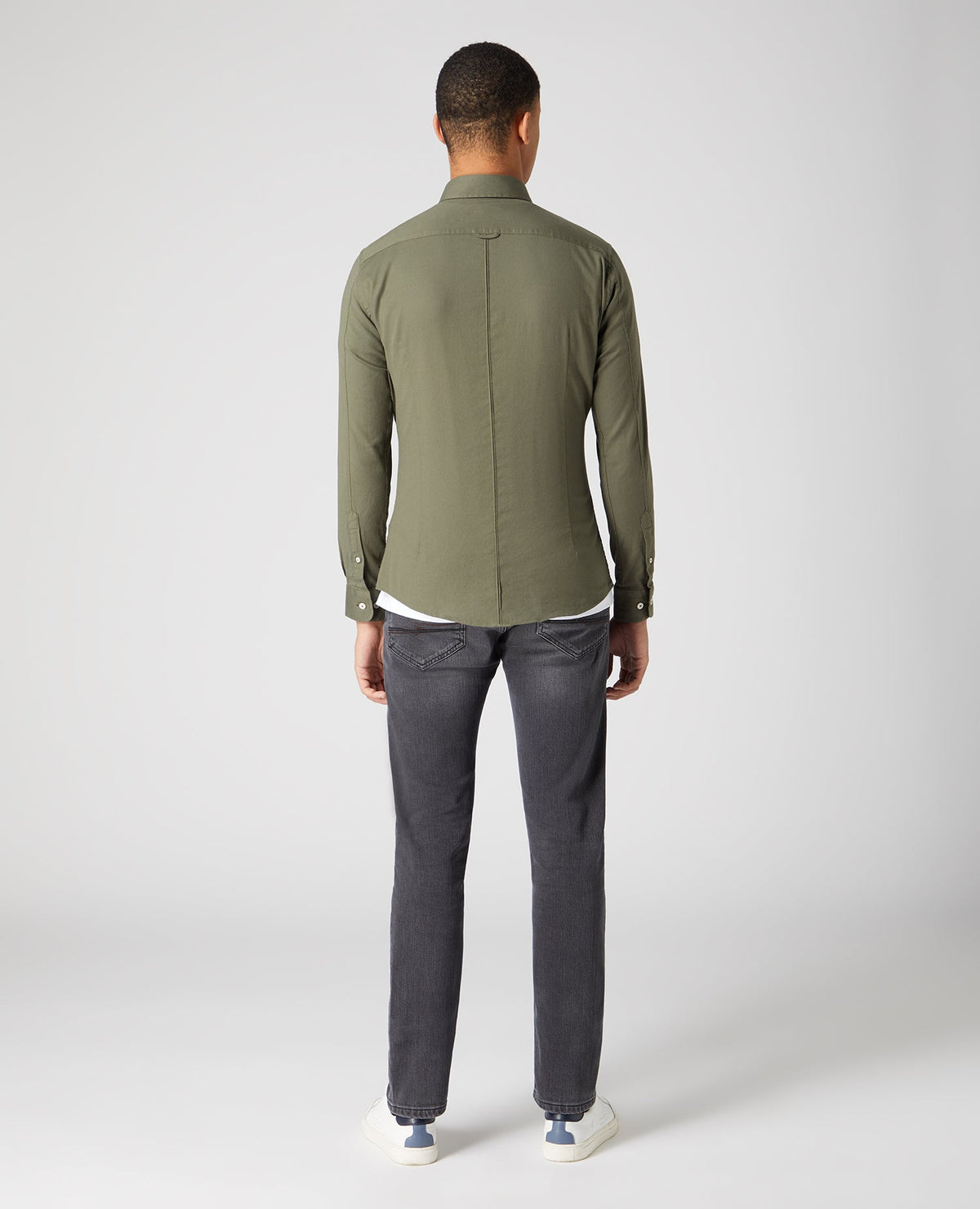 Man wearing a green Slim Fit Cotton Stretch Shirt