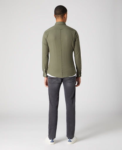 Man wearing a green Slim Fit Cotton Stretch Shirt