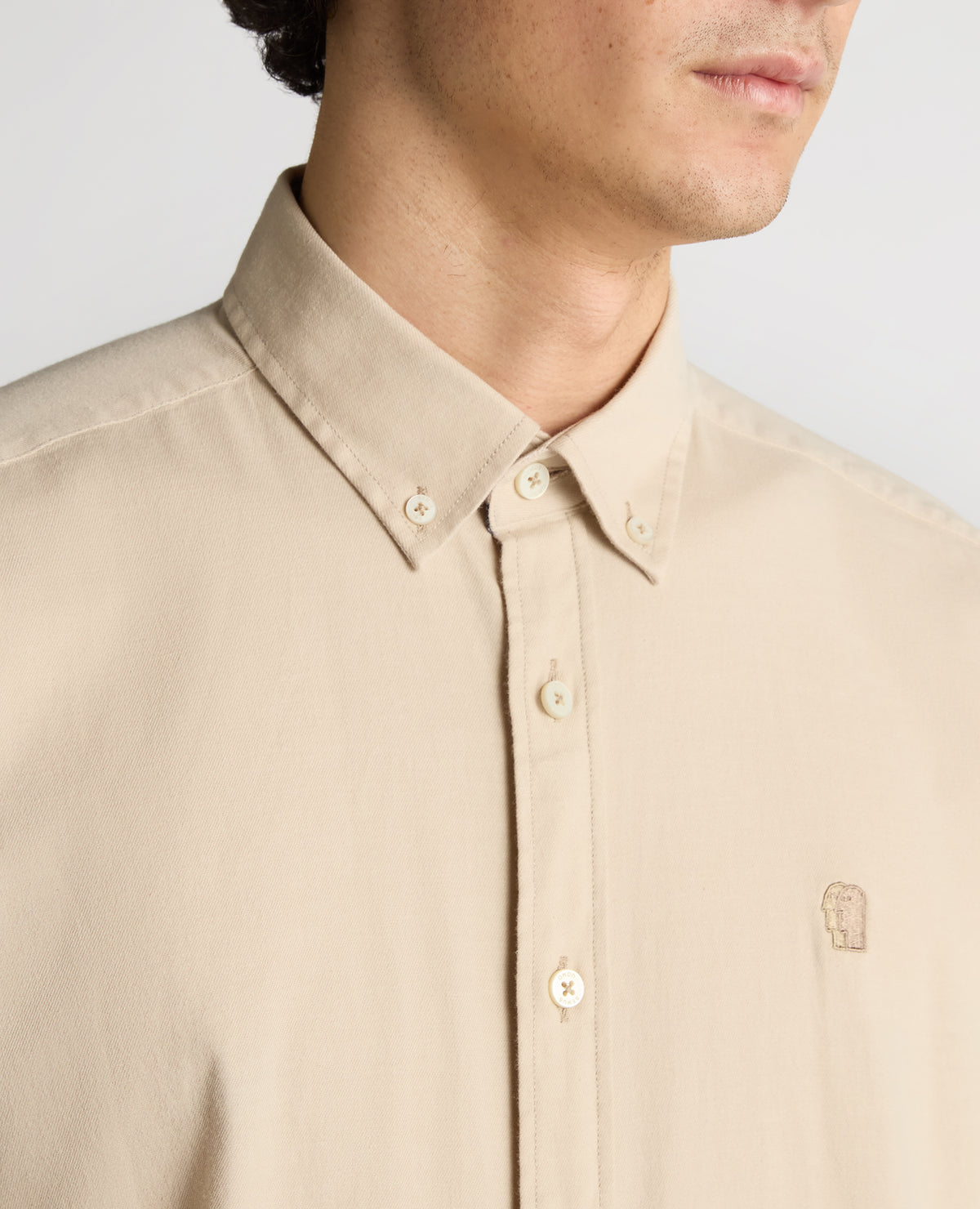 Man wearing a sand Slim Fit Cotton Stretch Shirt