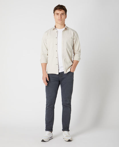 Man wearing a sand Tapered Fit Cotton Stretch Shirt