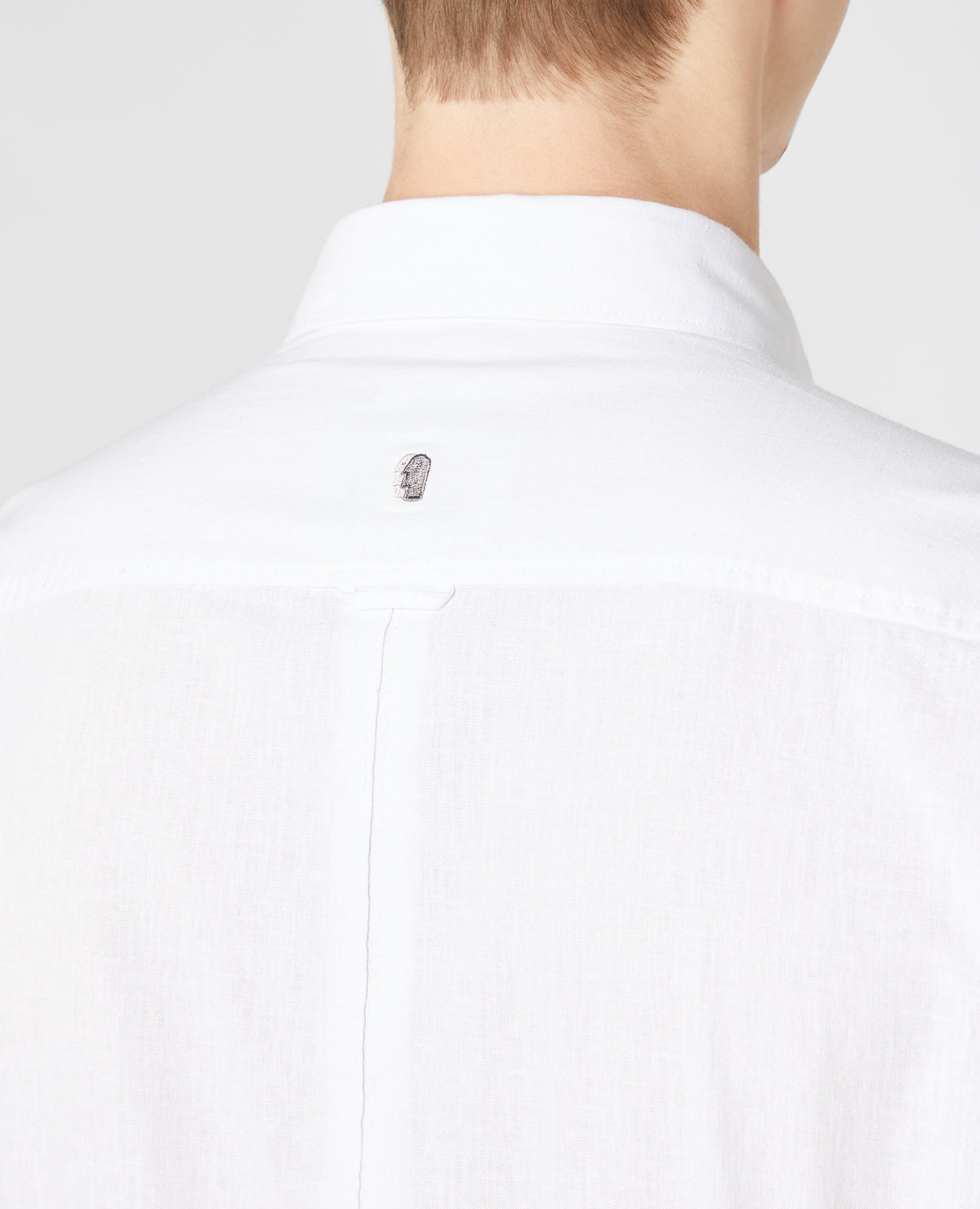 Man wearing a White casual shirt