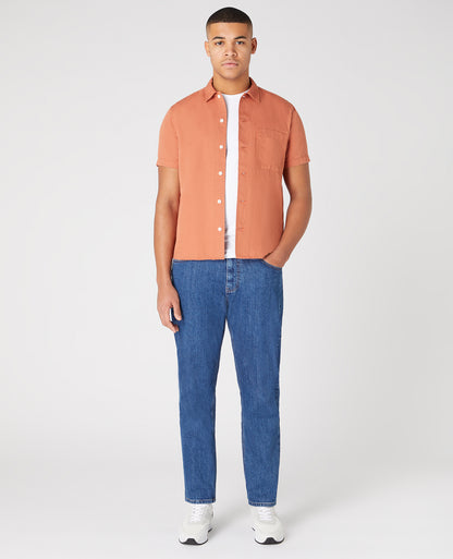 Man wearing a orange Tapered Fit Linen-Blend Short Sleeve Shirt