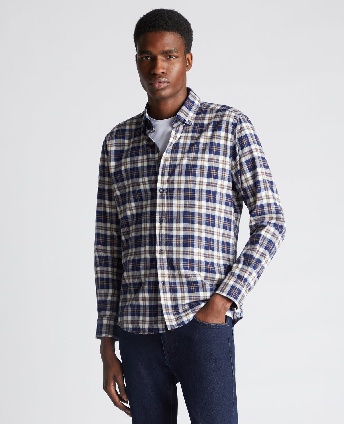 Man wearing a blue Tapered Fit Checked Cotton Shirt
