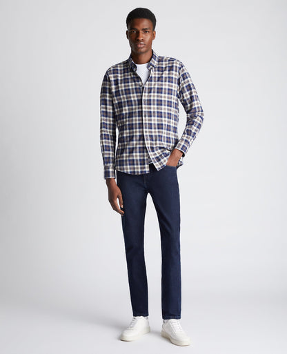 Man wearing a blue Tapered Fit Checked Cotton Shirt