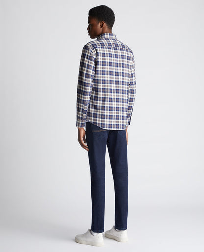 Man wearing a blue Tapered Fit Checked Cotton Shirt