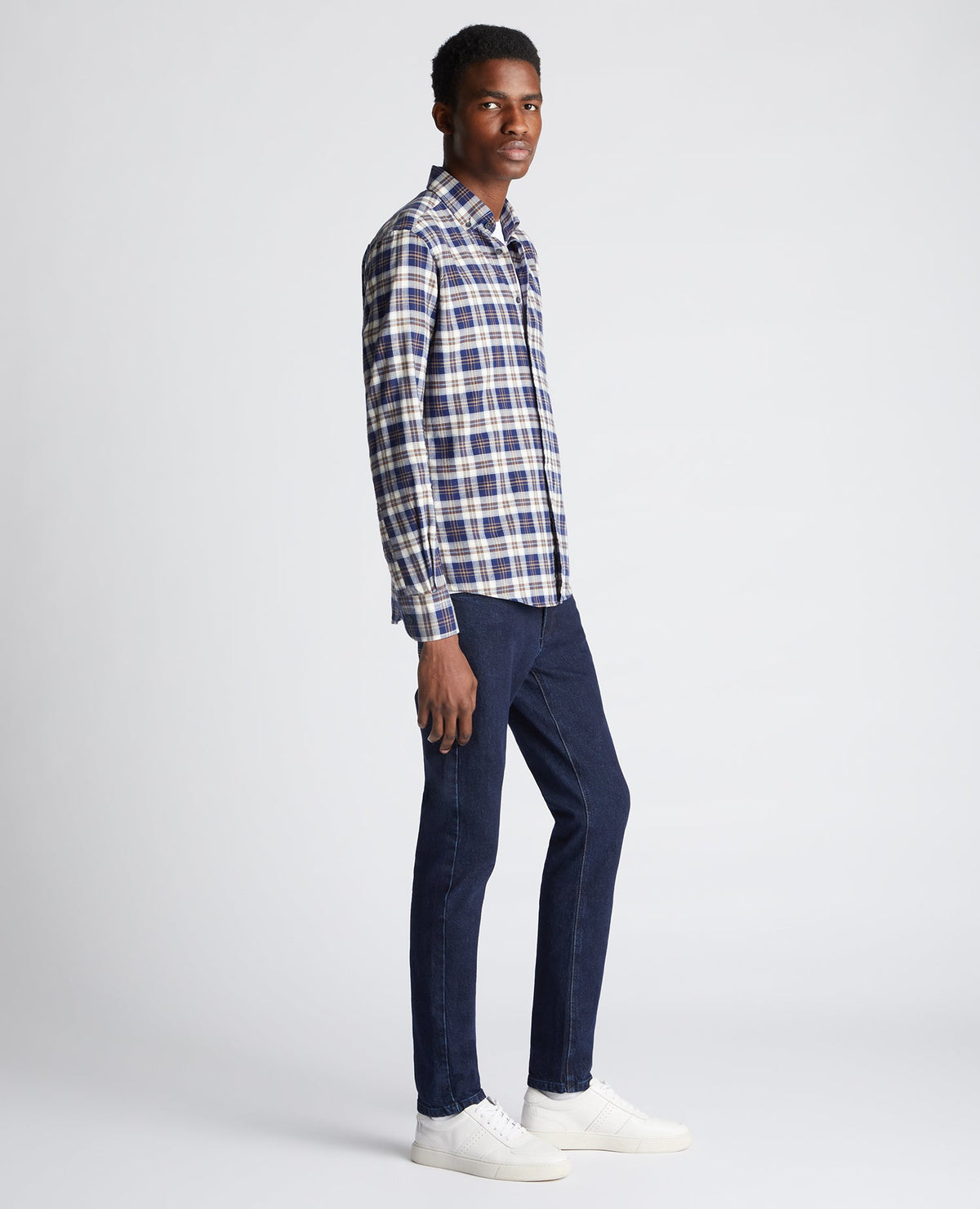 Man wearing a blue Tapered Fit Checked Cotton Shirt