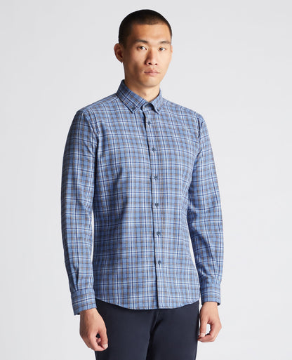 Man wearing a blue Tapered Fit Checked Cotton-Blend Shirt