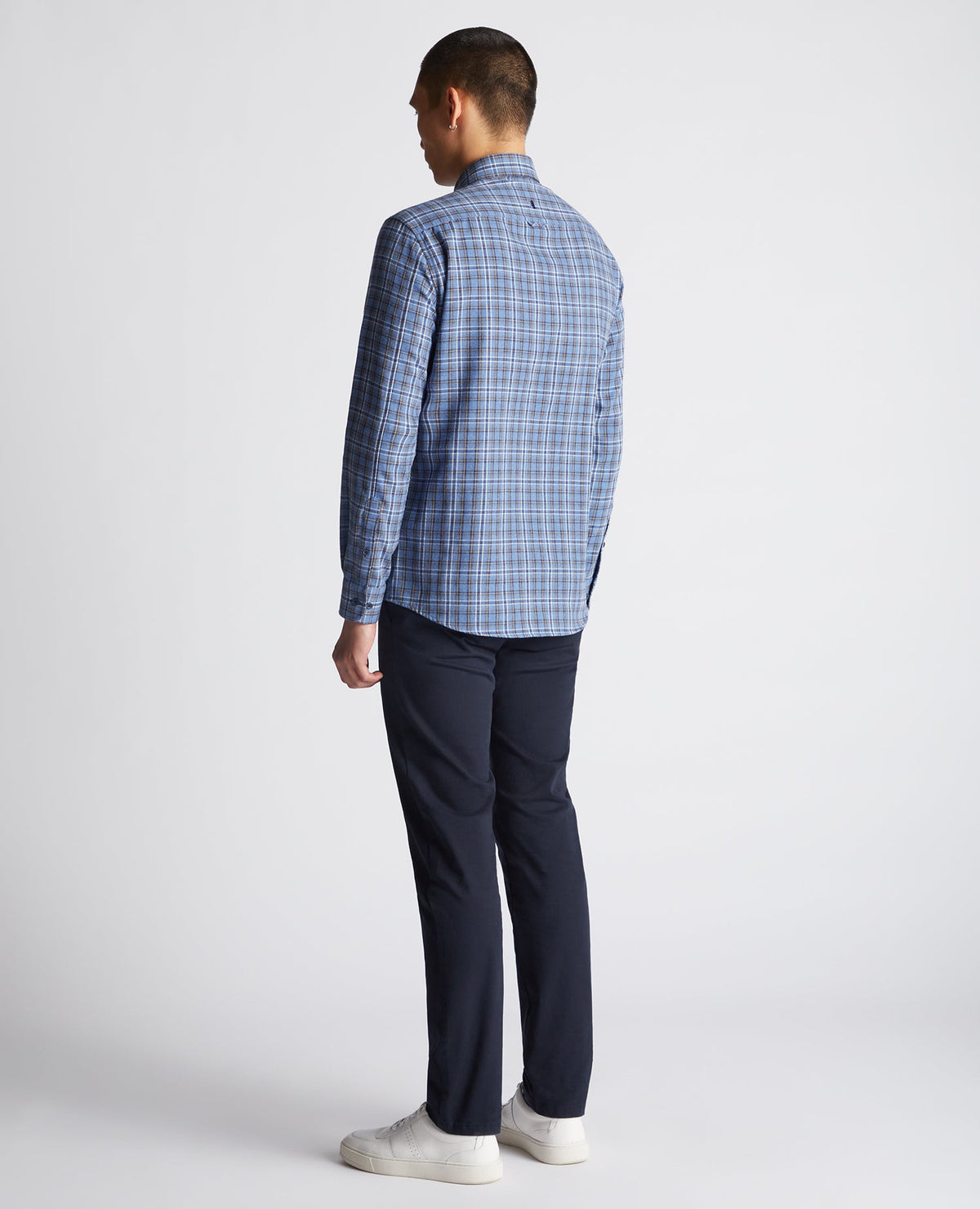 Man wearing a blue Tapered Fit Checked Cotton-Blend Shirt