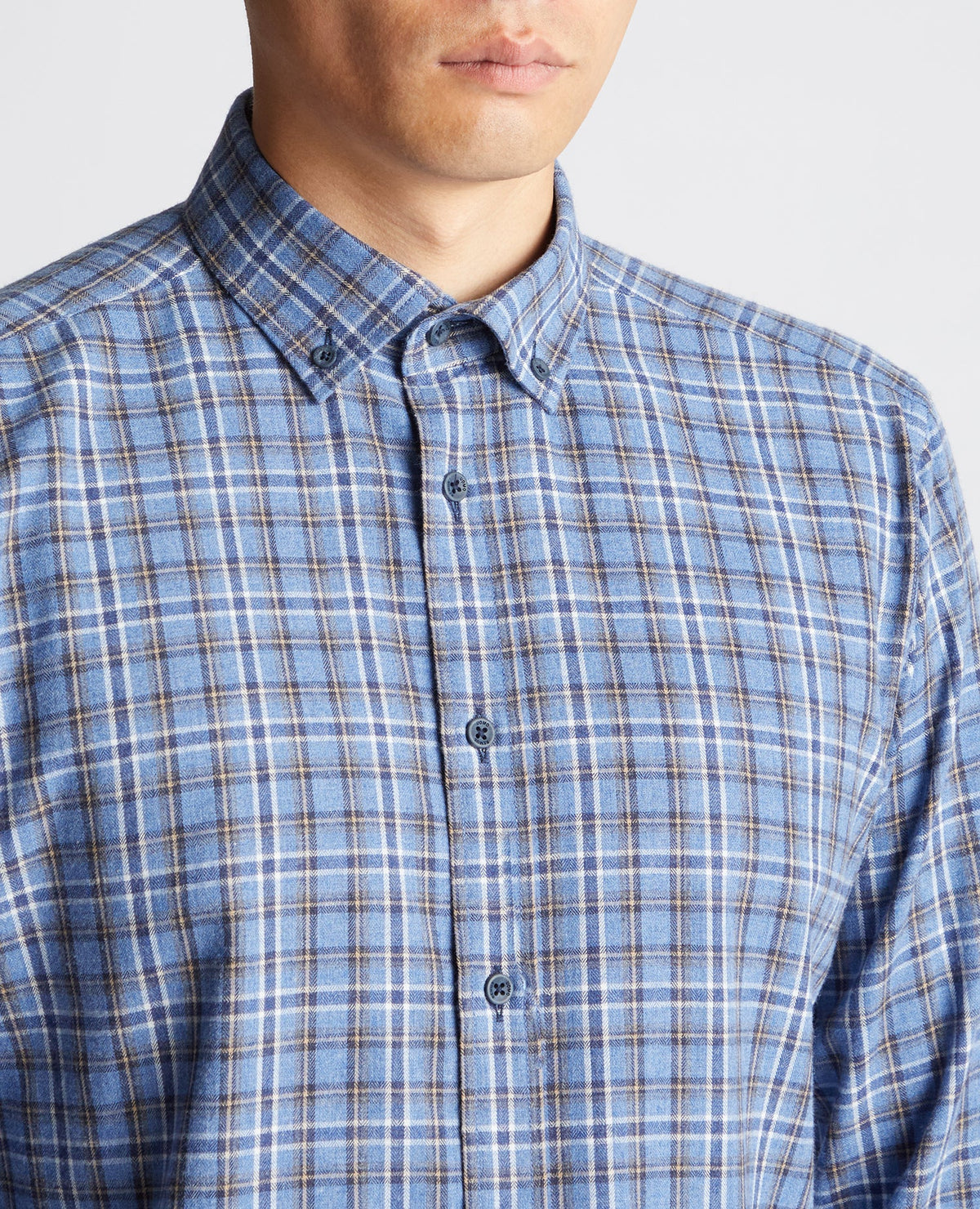 Man wearing a blue Tapered Fit Checked Cotton-Blend Shirt