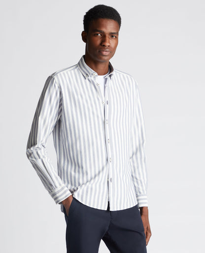 Man wearing a navy Tapered Fit Striped Cotton Shirt