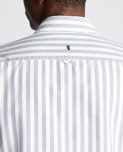 Man wearing a navy Tapered Fit Striped Cotton Shirt