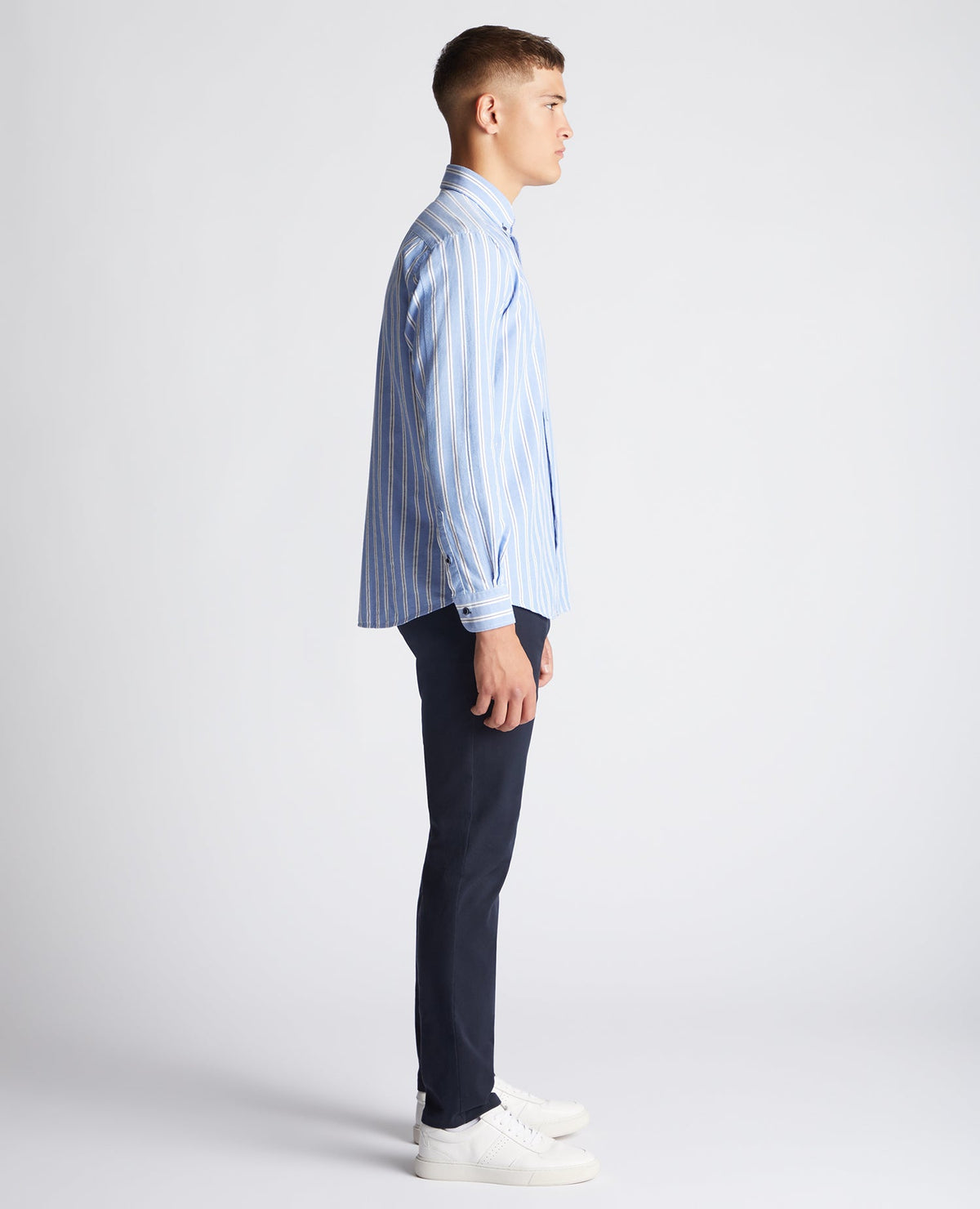 Man wearing a blue Tapered Fit Striped Cotton Shirt
