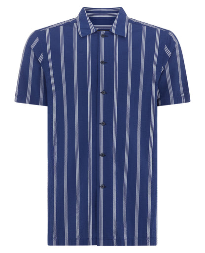 Man wearing a blue Tapered Fit Cotton Short Sleeve Shirt