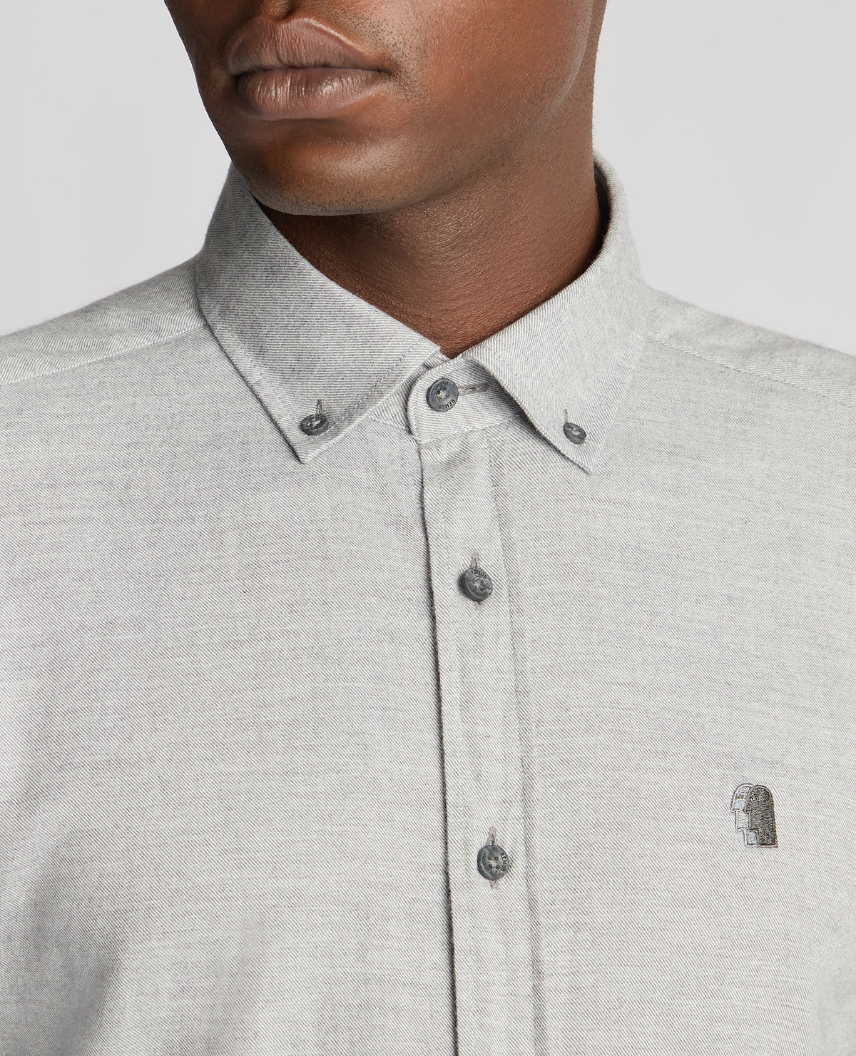 Man wearing a grey Tapered Fit Brushed Cotton Shirt