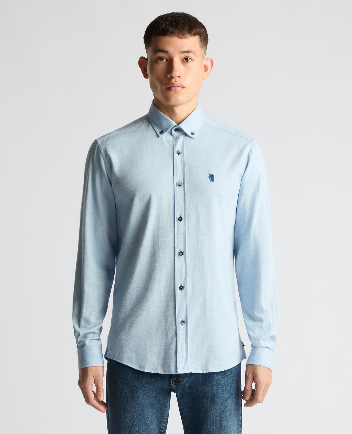 Man wearing a blue Tapered Fit Brushed Cotton Shirt