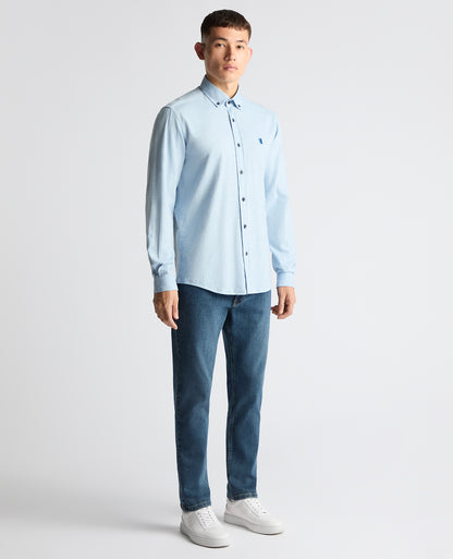 Man wearing a blue Tapered Fit Brushed Cotton Shirt