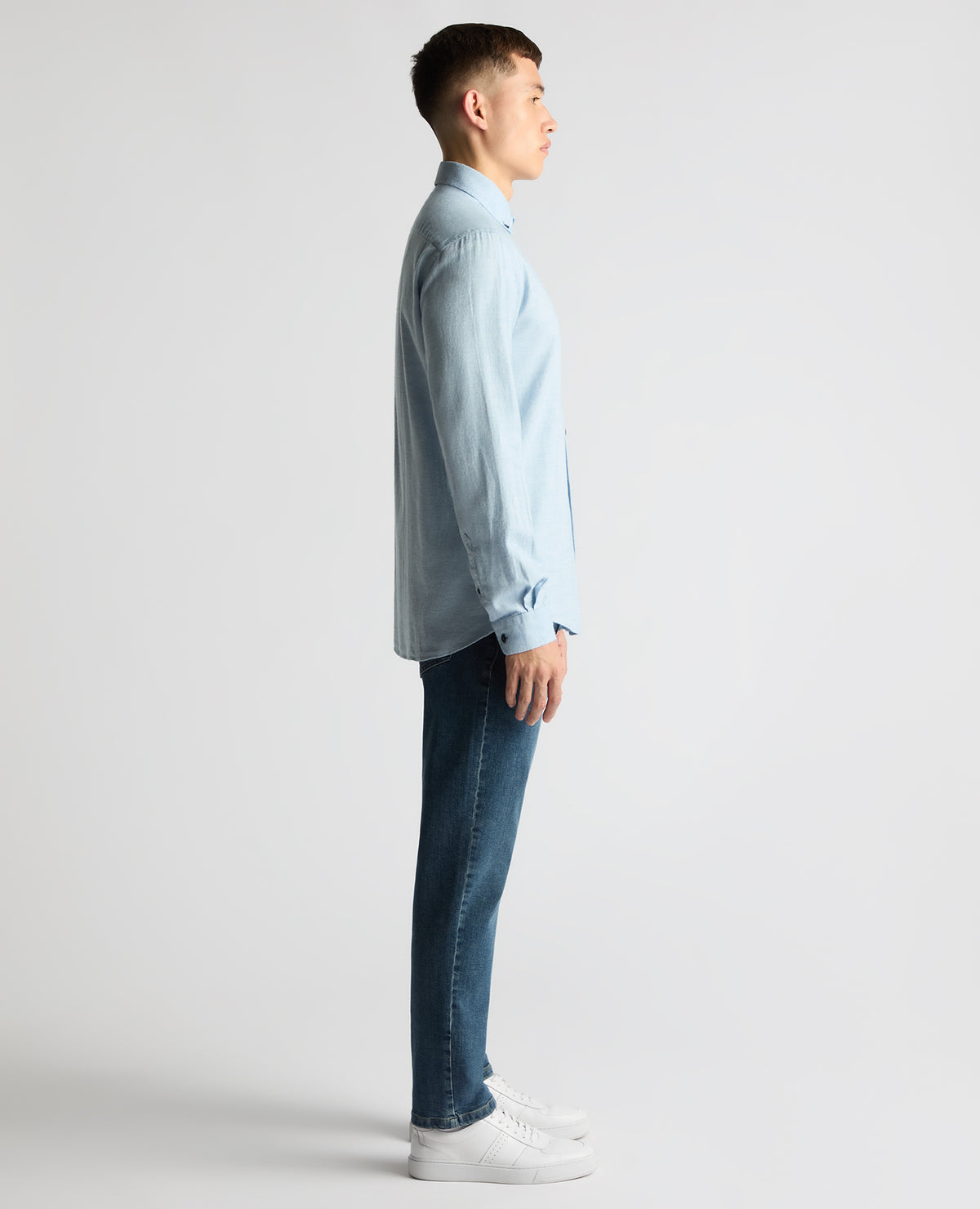 Man wearing a blue Tapered Fit Brushed Cotton Shirt