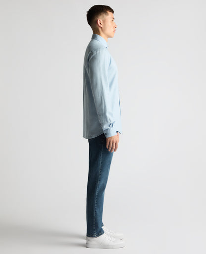 Man wearing a blue Tapered Fit Brushed Cotton Shirt