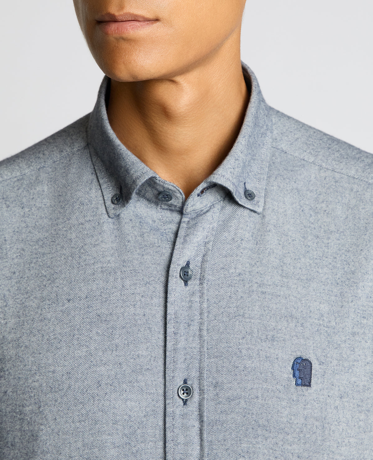 Man wearing a blue Tapered Fit Soft Cotton Shirt