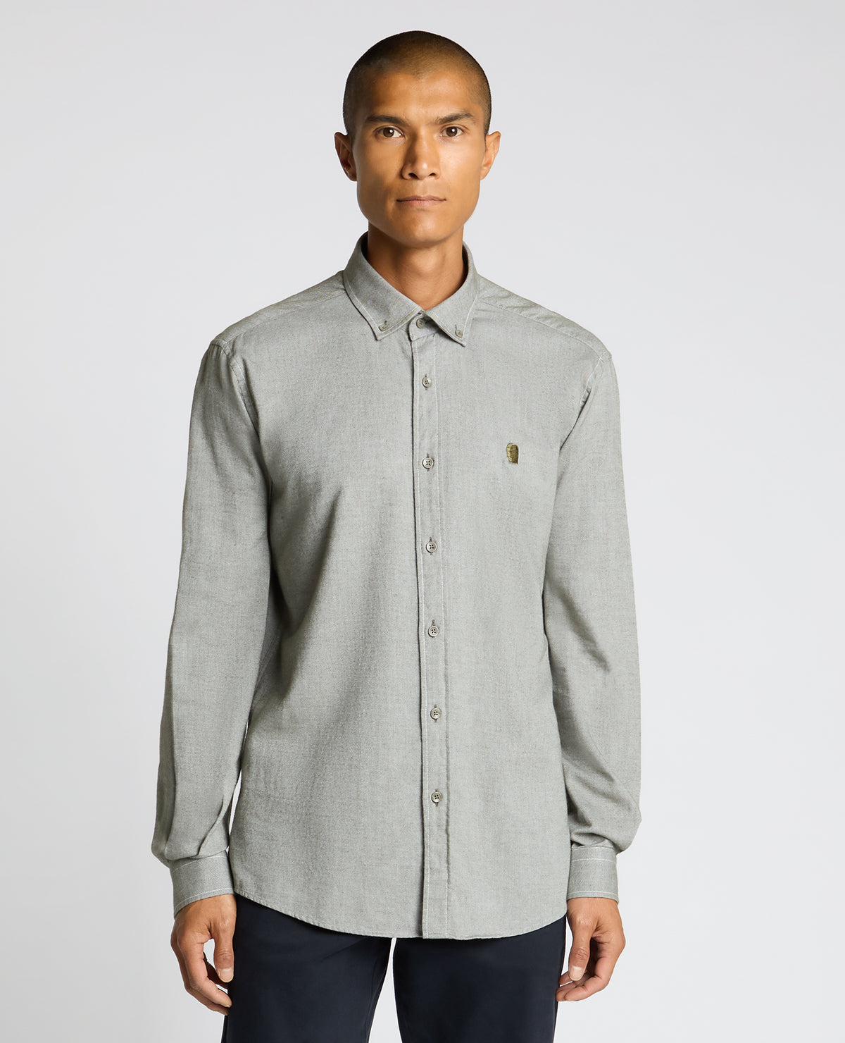 Man wearing a green Tapered Fit Soft Cotton Shirt