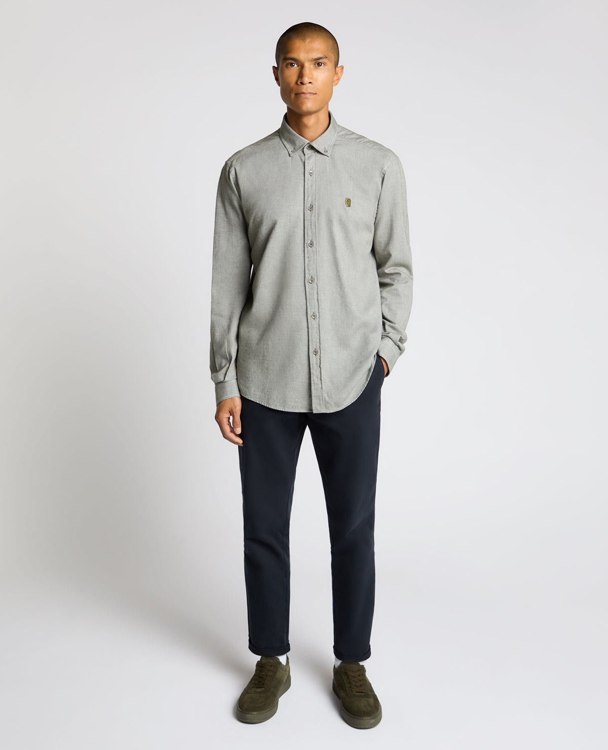 Man wearing a green Tapered Fit Soft Cotton Shirt