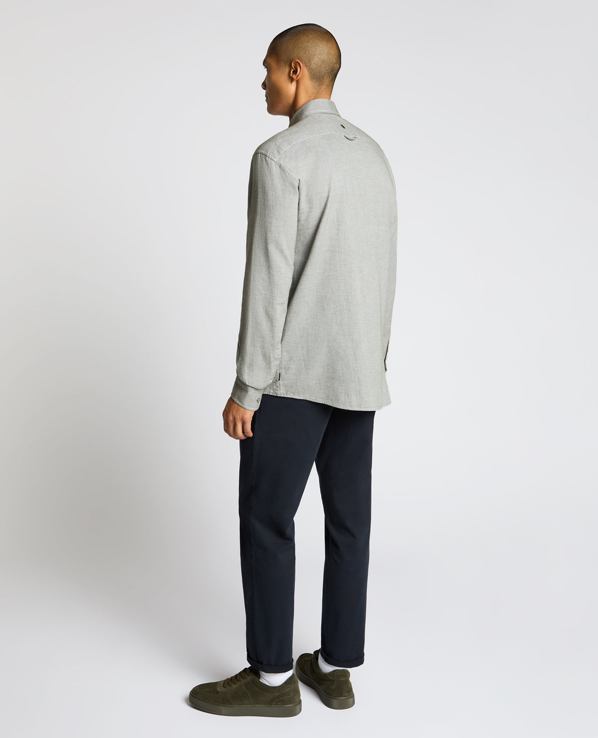 Man wearing a green Tapered Fit Soft Cotton Shirt