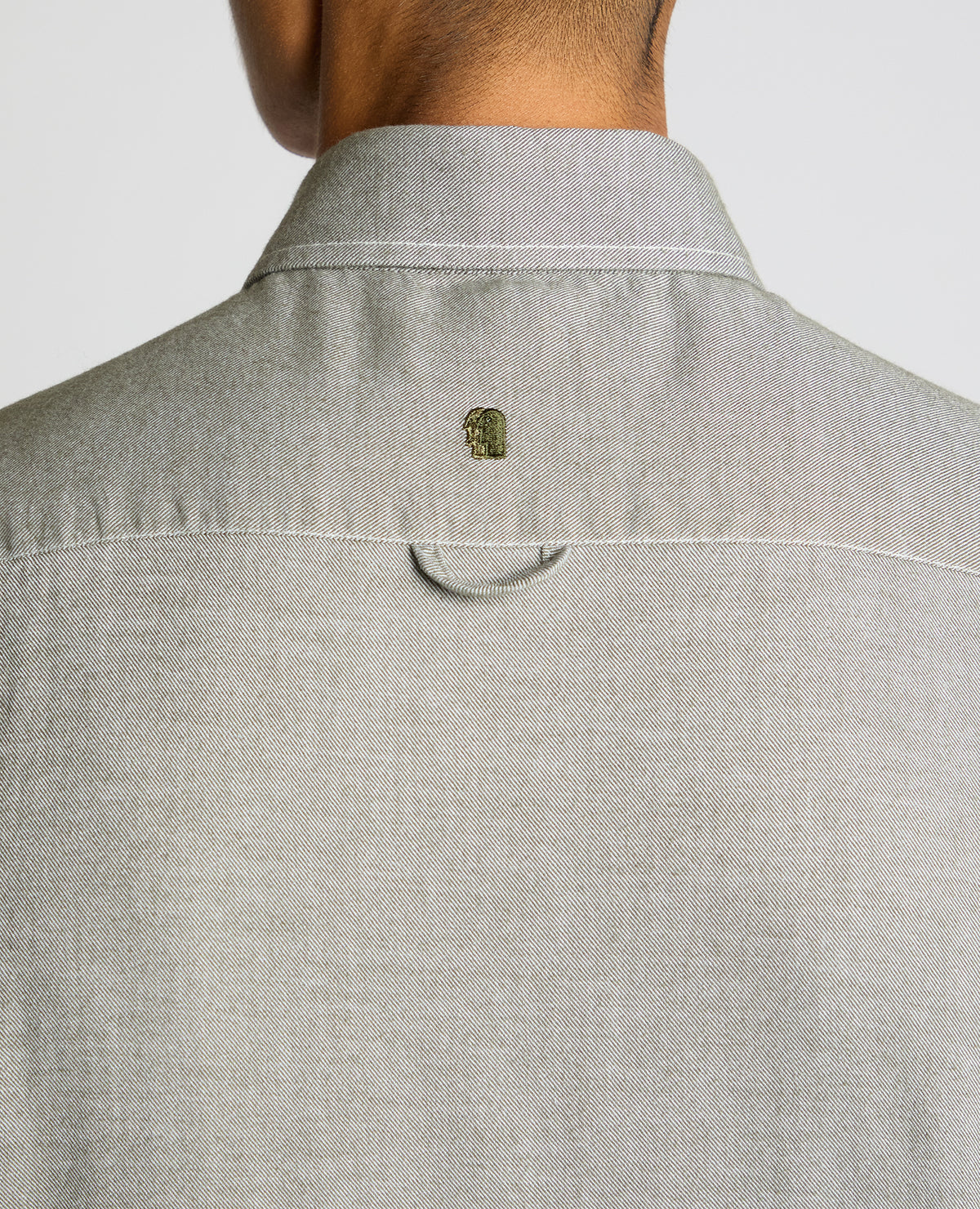 Man wearing a green Tapered Fit Soft Cotton Shirt