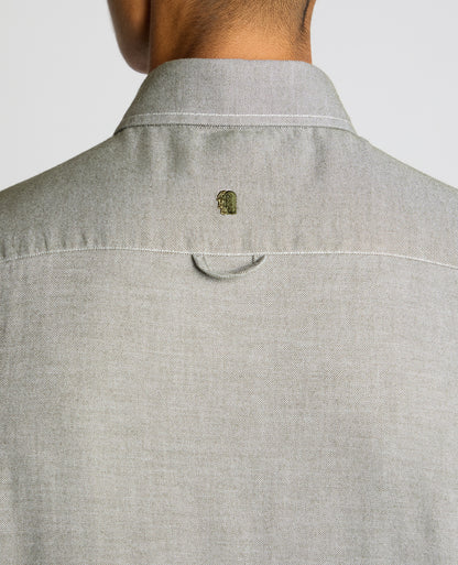Man wearing a green Tapered Fit Soft Cotton Shirt
