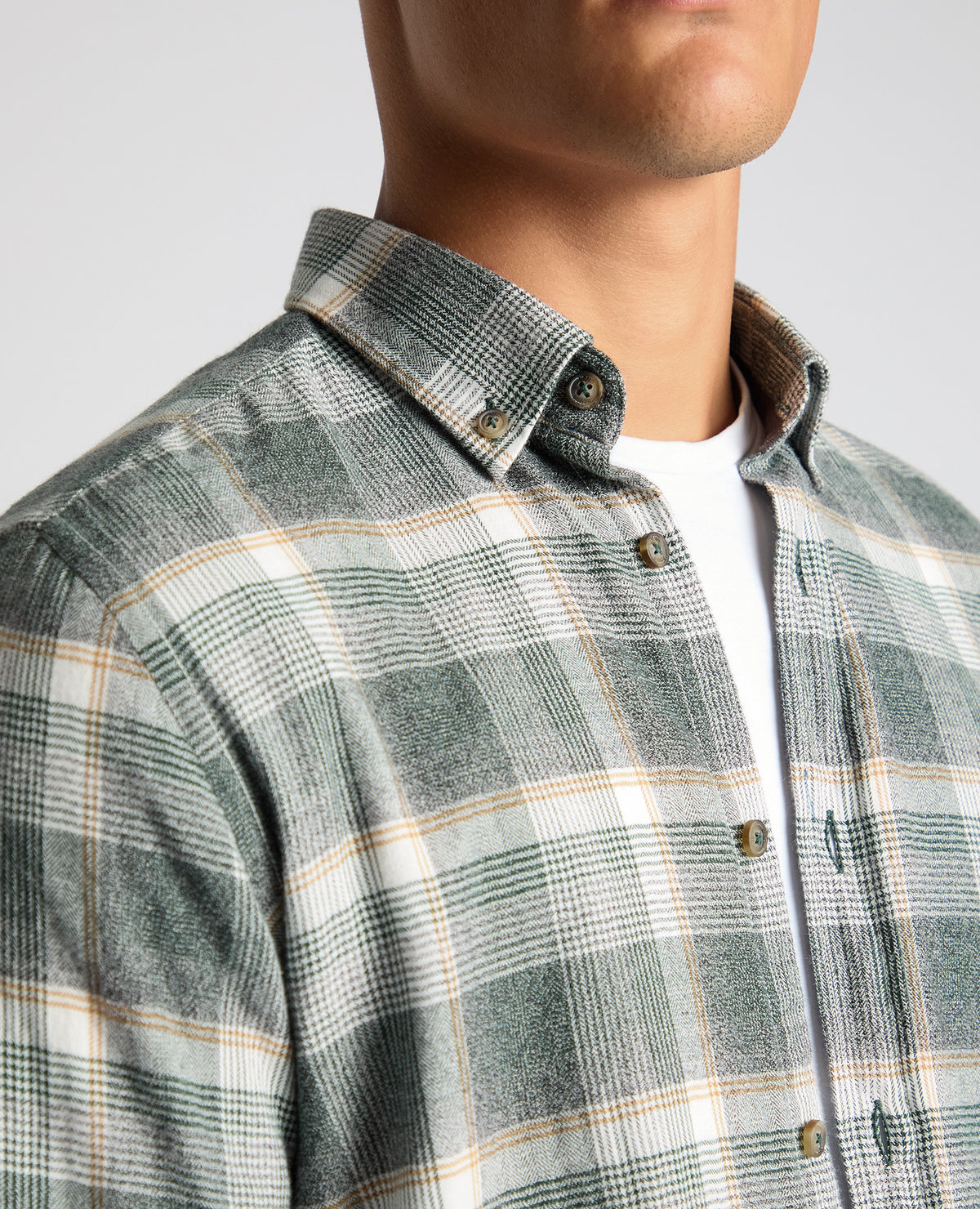 Man wearing a green Slim Fit Checked Brushed Cotton Shirt
