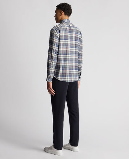 Man wearing a blue Tapered Fit Checked Brushed Cotton Shirt