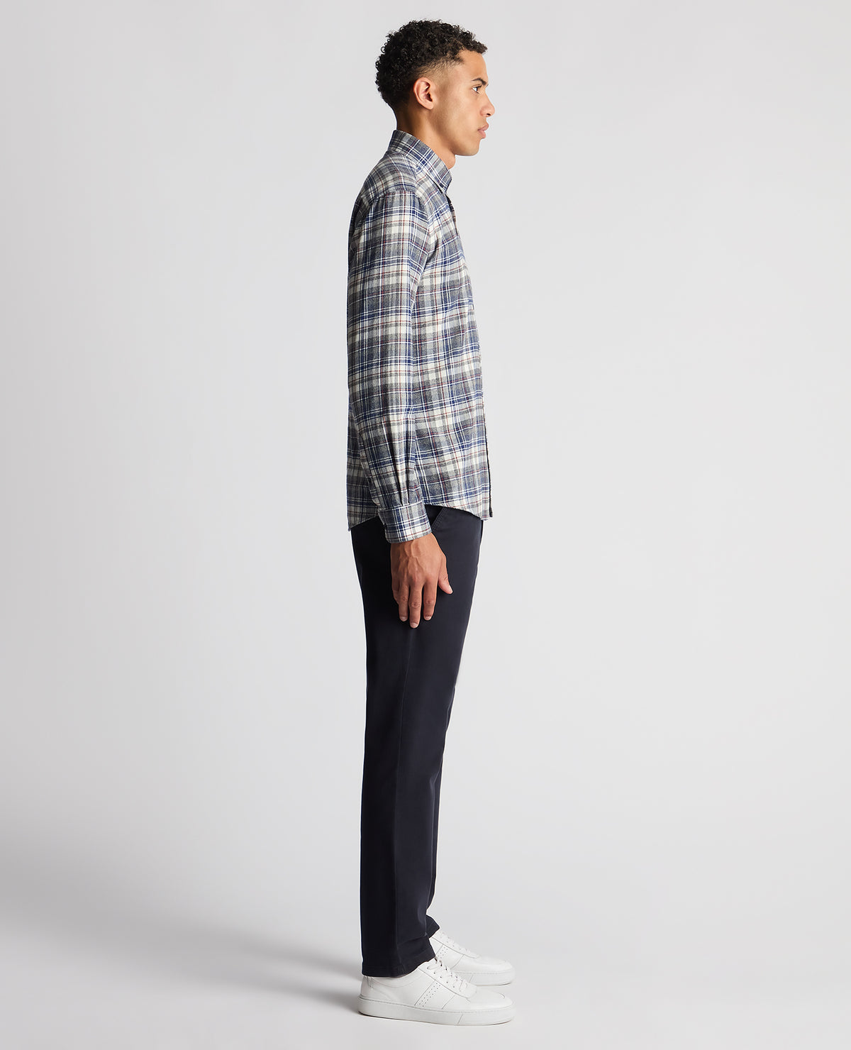 Man wearing a blue Tapered Fit Checked Brushed Cotton Shirt