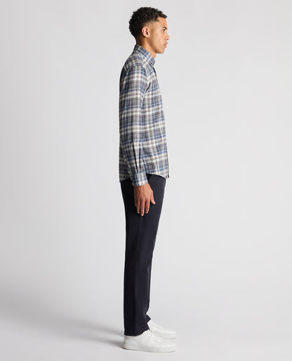 Man wearing a blue Tapered Fit Checked Brushed Cotton Shirt